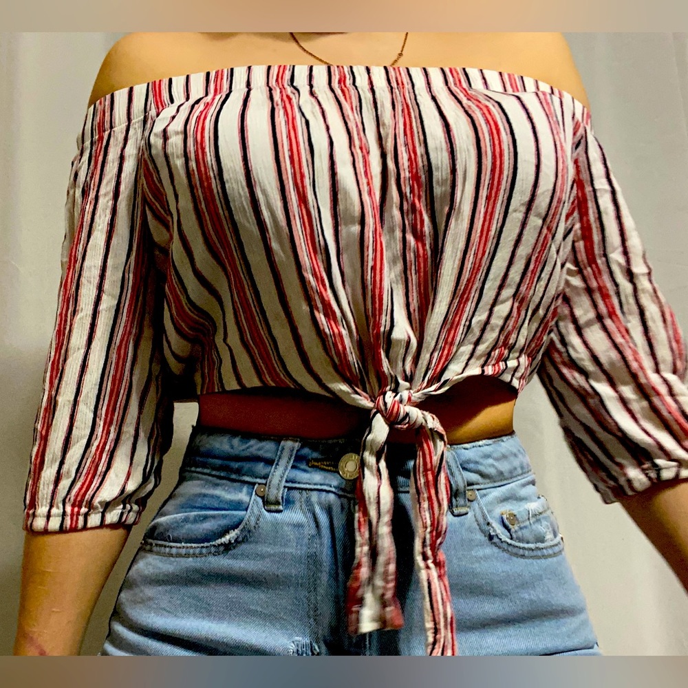 Cropped dress shirt fits as small and medium barley used.
